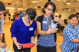 Families doing arts and crafts at Mentor Appreciation Night