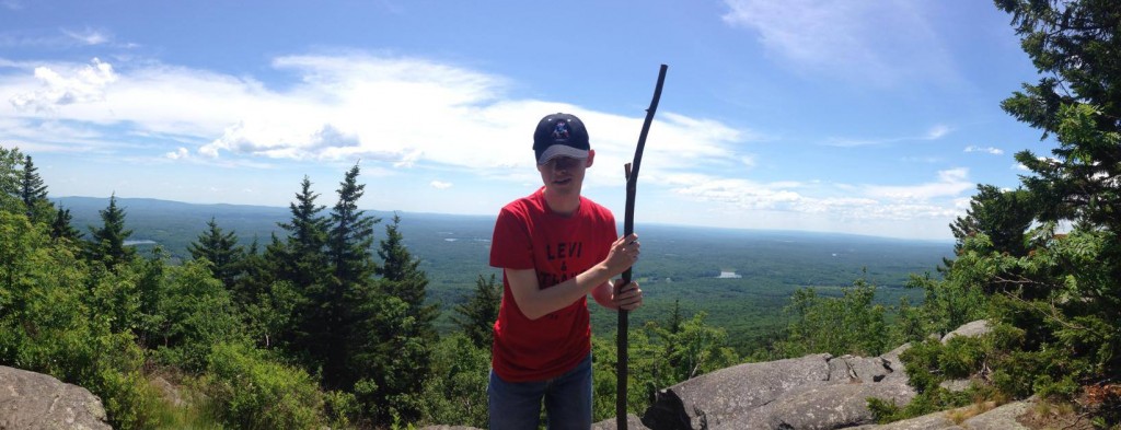 Tyler at the top of Mount Monadnock after a day of hiking with college friends.