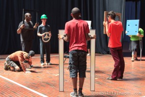 ATT participants engaged in a skit with doors and windows