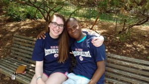 A mentor and mentee sitting on a bench