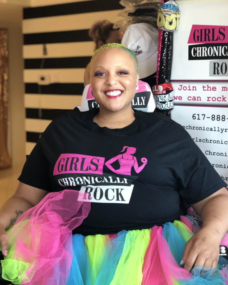 This picture is of Keisha having a fun photoshoot at home wearing a t-shirt design Girls Chronically Rock