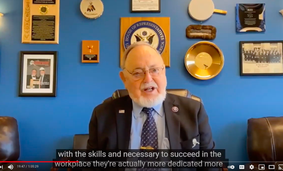 Don Young speaking at his desk