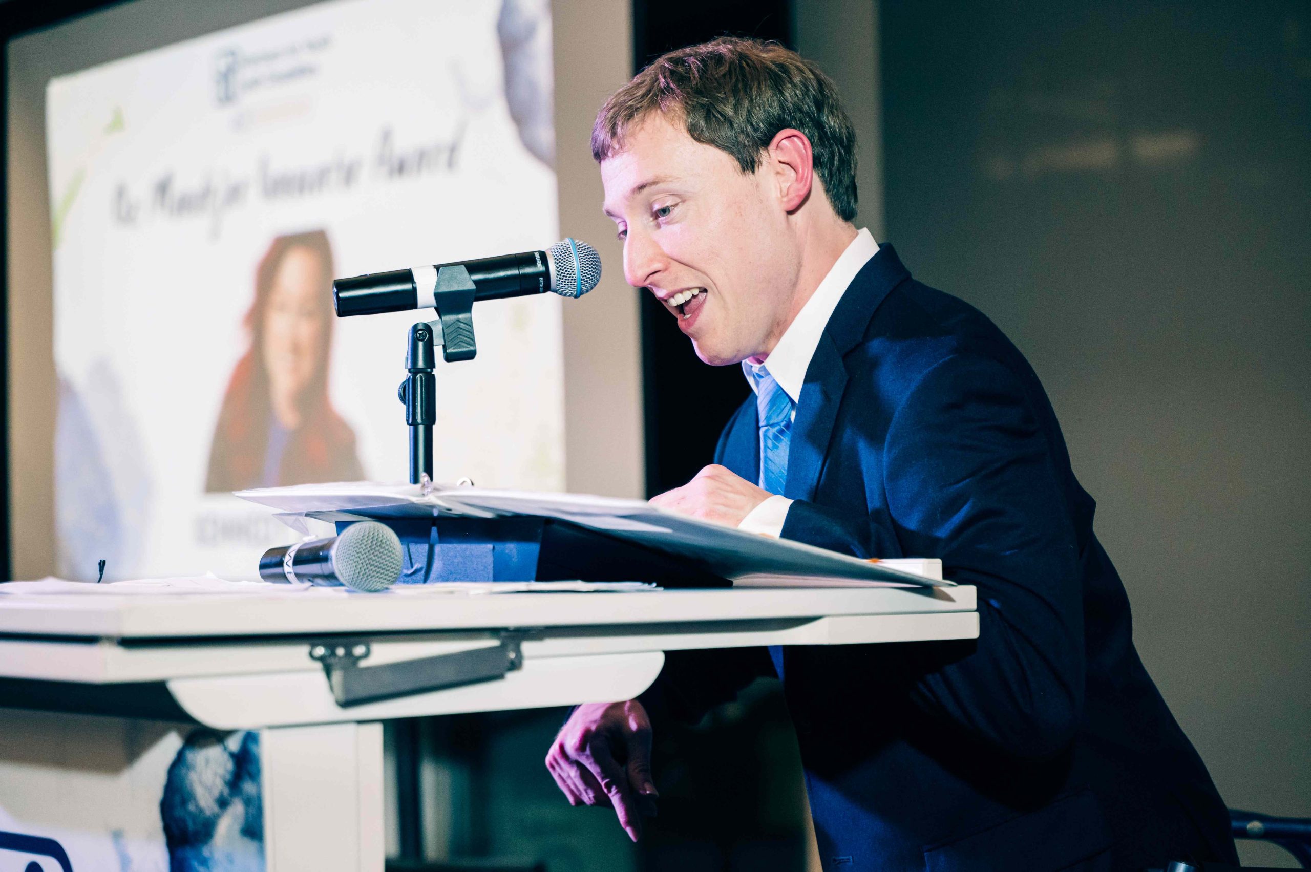 Austin Carr speaks onstage.