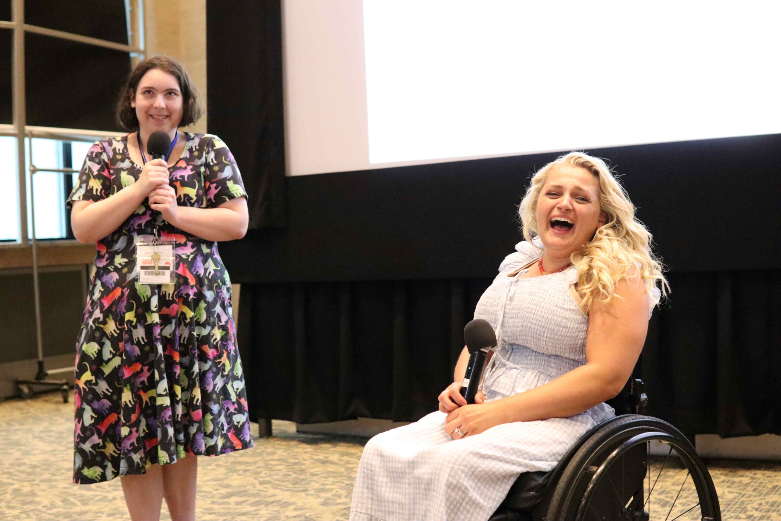 Ali Stroker smiling, next to a YLF participant
