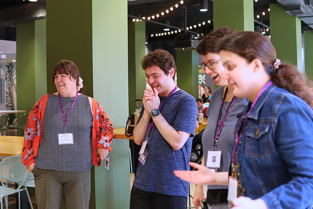 YLF participants smile while playing an ice-breaker game.
